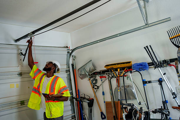 Professional Garage Door technician working in Walkerton, IN